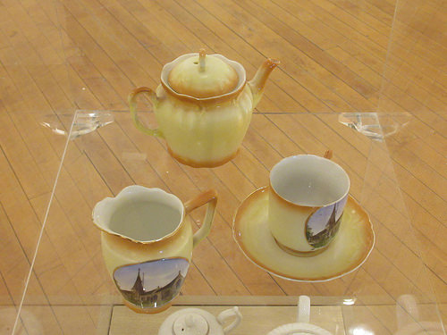 tea cups and teapot on display
