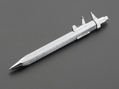 Photo of caliper pen on dark gray background