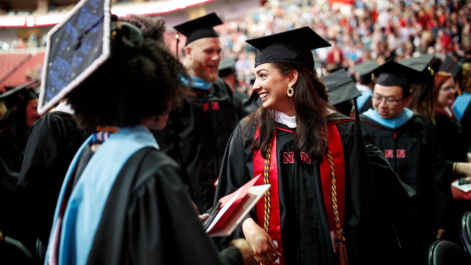 Graduate students at commencement ceremony