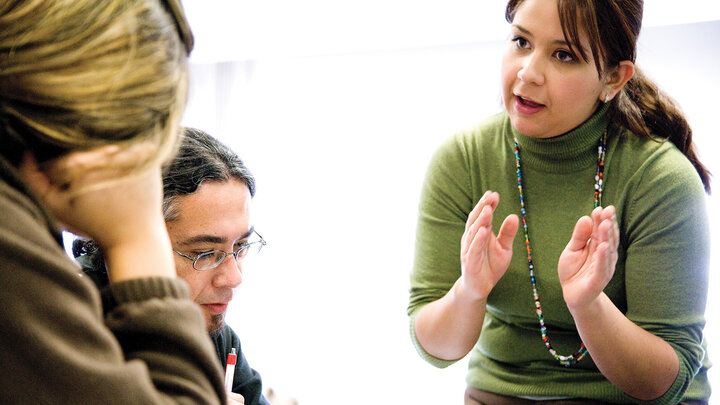 Professor with two students