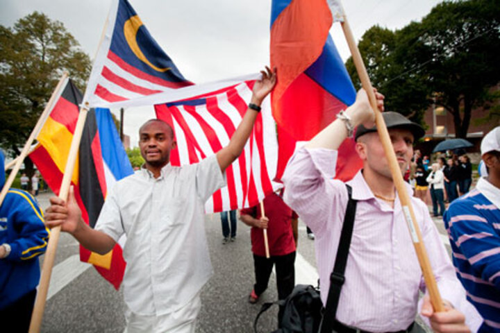 International graduate students marching in a parade